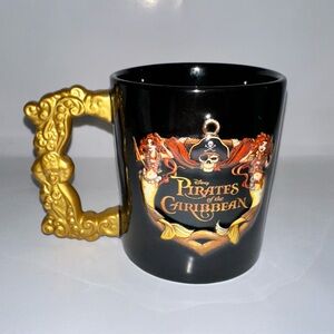 Disney Pirates of the Caribbean Black Mug with Gold Handle